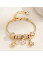 Women's Adjustable Everyday Bracelet With Gold Rhinestone Bow, Heart & Lollipop Beaded Decor