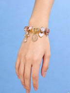 Women's Adjustable Everyday Bracelet With Gold Rhinestone Bow, Heart & Lollipop Beaded Decor